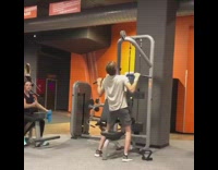 Collab Kook Of The Day - Guy uses lat pulldown machine at gym and jumps in the air