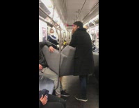 Guys bring grey couch onto subway pt. 2