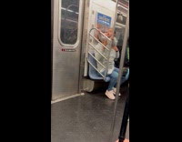 Mother tries to stop baby to lick pole