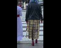 Girl yellow skirt made from metrocards crosswalk