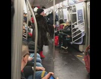 woman large black jacket dancing on pole