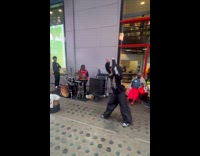 Woman dance live band perform on street