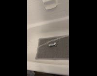 Apartment shower head falls off water on