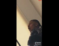 Guy sings while friend watches TV