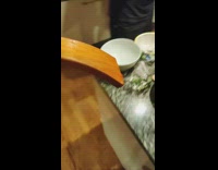 Arm of the chair used to cook food