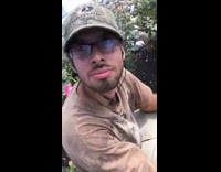 Collab BitchIG2 - Guy walks up to friend squatting by flowers 