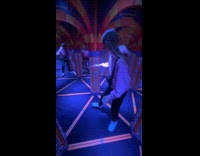 High woman enters mirror maze