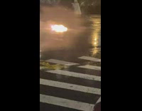 A fire on wet floor coming from sewer drain