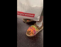 Person with colorful and many shoe laces