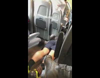 Man in work out clothes does push ups on train