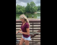 Man black jacket dance video lake park