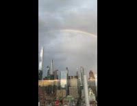 Double rainbow seen with amazing city view