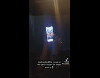 Guy in crowd asks people for tinder decisions 