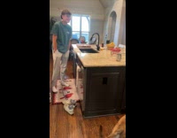 Mom and son pranks dad with water running 