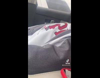 Girl thinks guy next to car is cute reclines chair to hide