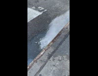 White dry ice looking liquid by road