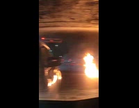 Car on Fire Turns and Drives Away
