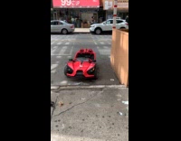 Submitter shows toy car parked on street