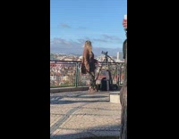 Girl shake head lean on railings tripod