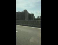 Guy rides bicycle freeway doordash food delivery 