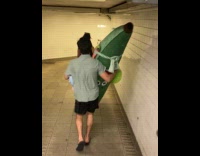 Collab Subway Creatures - Man carrying banana plushie at subway station