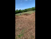 Boy flips over bike jumps over hump