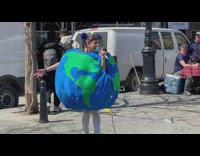 Girl raps in earth costume 