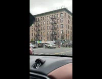 Car stuck on middle divide in car accident