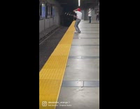 Man in red ski mask tiktok dance at the subway