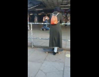 Woman ride on mobility scooter music video graffiti