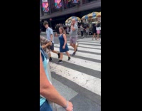 Woman with microphone and speakers preaching about Jesus