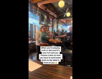 Filmer gives water shots to random men