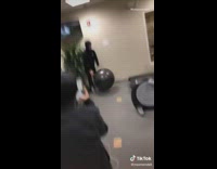 Guy puts exercise ball by treadmill fail