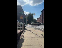 Shattered marble tiles scattered on street