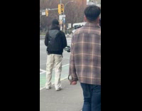 DJ mixing beats on the sidewalk