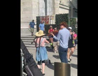 2 violinists in denim perform 