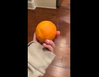 Orange with discoloration on one slice