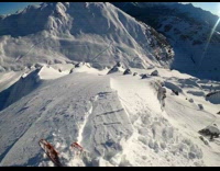 pov skier in orange going down mountain