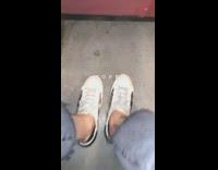 Giant cockroach underneath subway chair