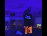 Guy body slams jumps coffee table orange