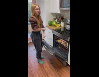 Girl puts soda in oven 