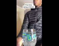 Guy licks finger after stirring water hitman 