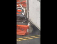 Truck hits construction barriers and signs 