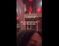 Friends wearing mustache spying on friends date 