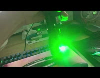 Green laser light burns a tissue box