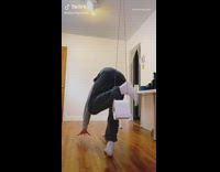 Guy spits ball through toilet paper tube 