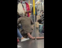 Guy blue face mask rat costume subway 