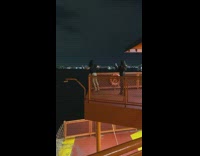 Guy pretends hes in the titanic on boat