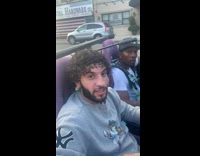 Man drives car with boot steering wheel