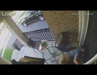 Man trips of the stairs on the front yard